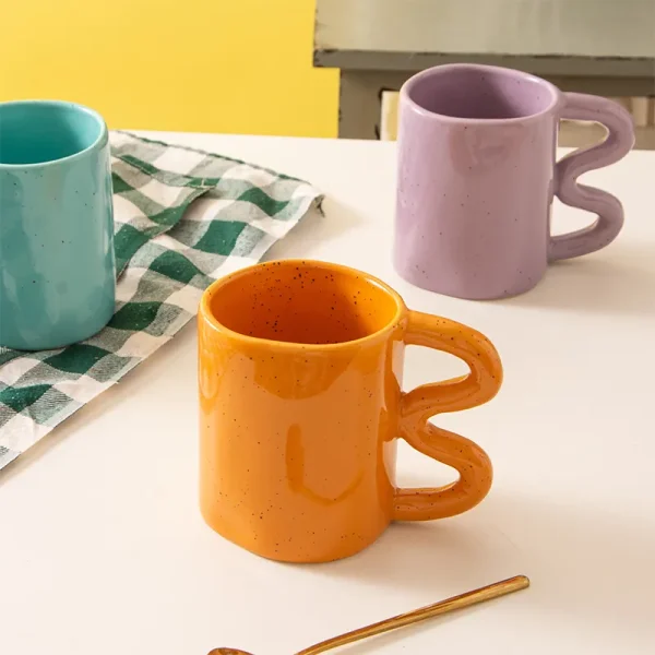 wholesale ceramic mug with wavy handle 2