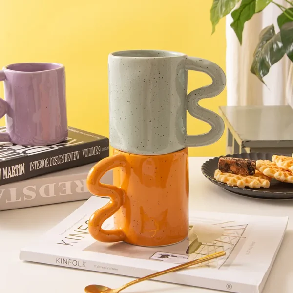 wholesale ceramic mug with wavy handle 5