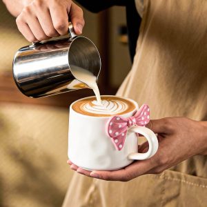 wholesale bow-embossed ceramic coffee cup 1