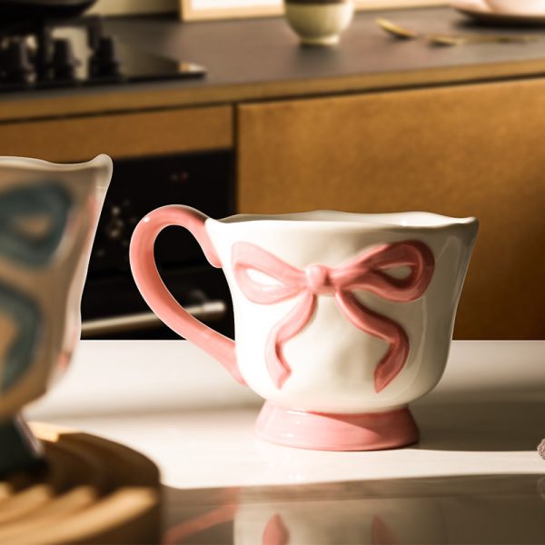 Wholesale Ceramic Coffee Cups with 3D Bowknot Embossed Ribbon Decoration