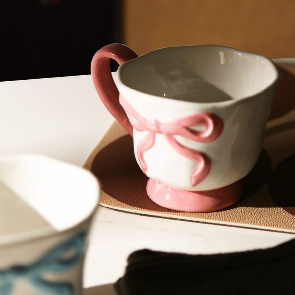 Wholesale Ceramic Coffee Cups with 3D Bowknot Embossed Ribbon Decoration