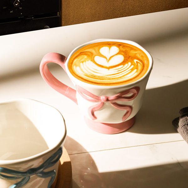 Wholesale Ceramic Coffee Cups with 3D Bowknot Embossed Ribbon Decoration