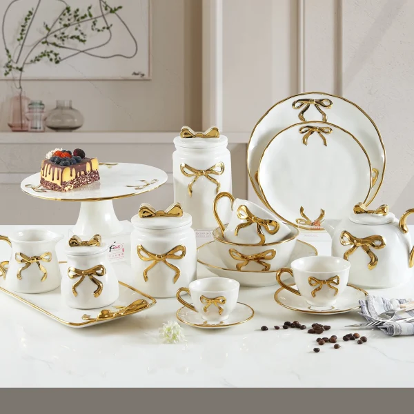 Wholesale Ceramic Dinnerware Set with Golden Bowknot Detailing, Suitable for Hotels, Cafes, and as Gift Sets
