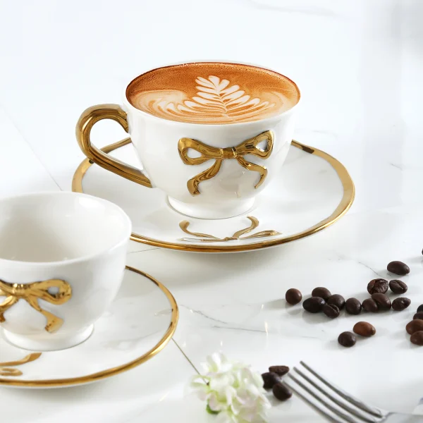 Wholesale Ceramic Dinnerware Set with Golden Bowknot Detailing, Suitable for Hotels, Cafes, and as Gift Sets