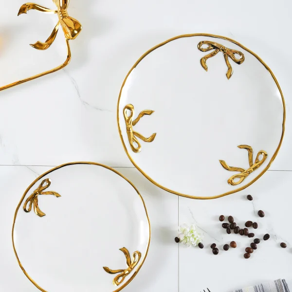 Wholesale Ceramic Dinnerware Set with Golden Bowknot Detailing, Suitable for Hotels, Cafes, and as Gift Sets
